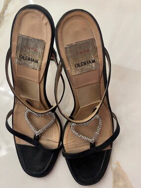 Oldham ,  Black Strappy Heels with Heart Crystal Accent
